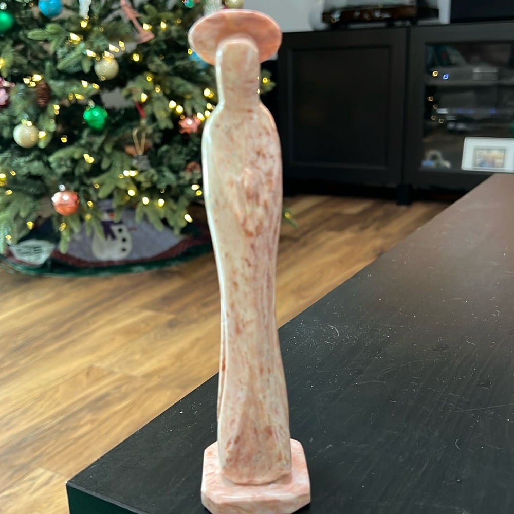 Mary carved pink stone figure